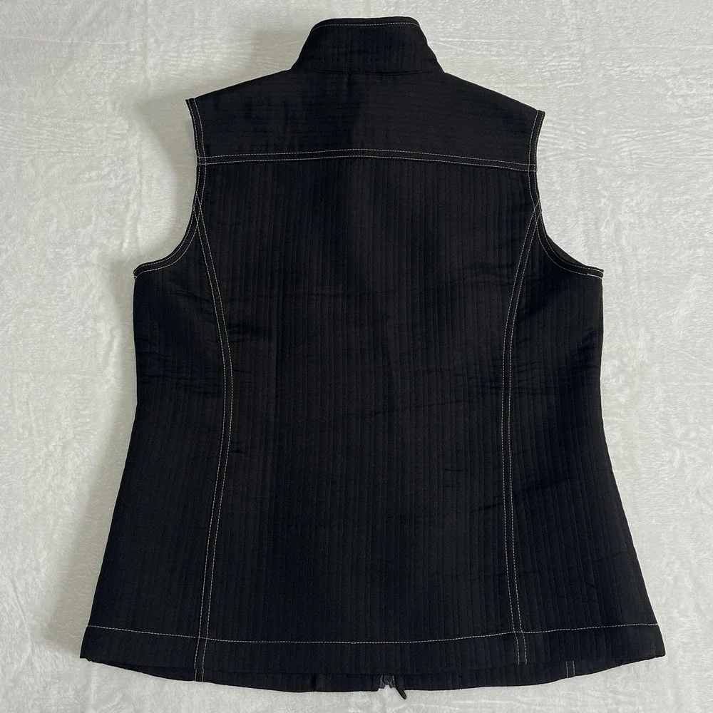 Chico's Vest Size 1 Zip up front pockets on front Black With White Stitching‎